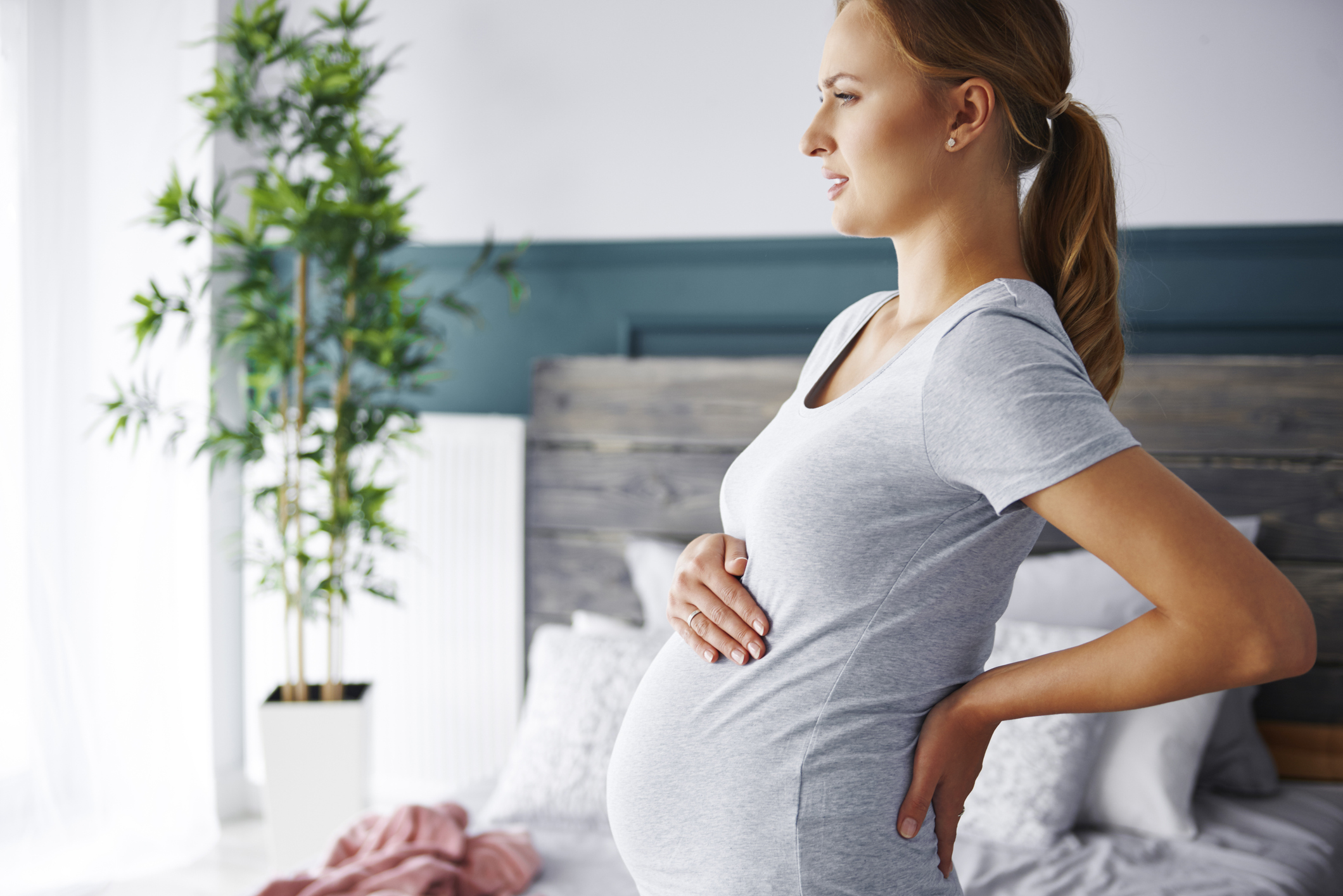 6 Tips to Relieve Back Pain During Pregnancy - BenchMark Physical
