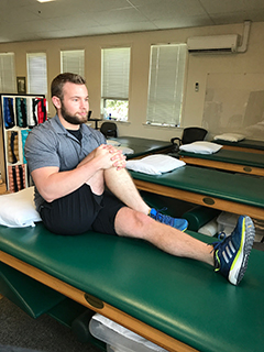 Seated IT Band Stretch - Drayer Physical Therapist