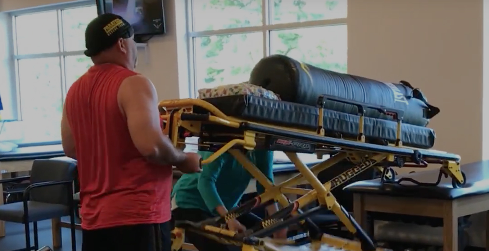 firefighter receiving physical therapy treatment